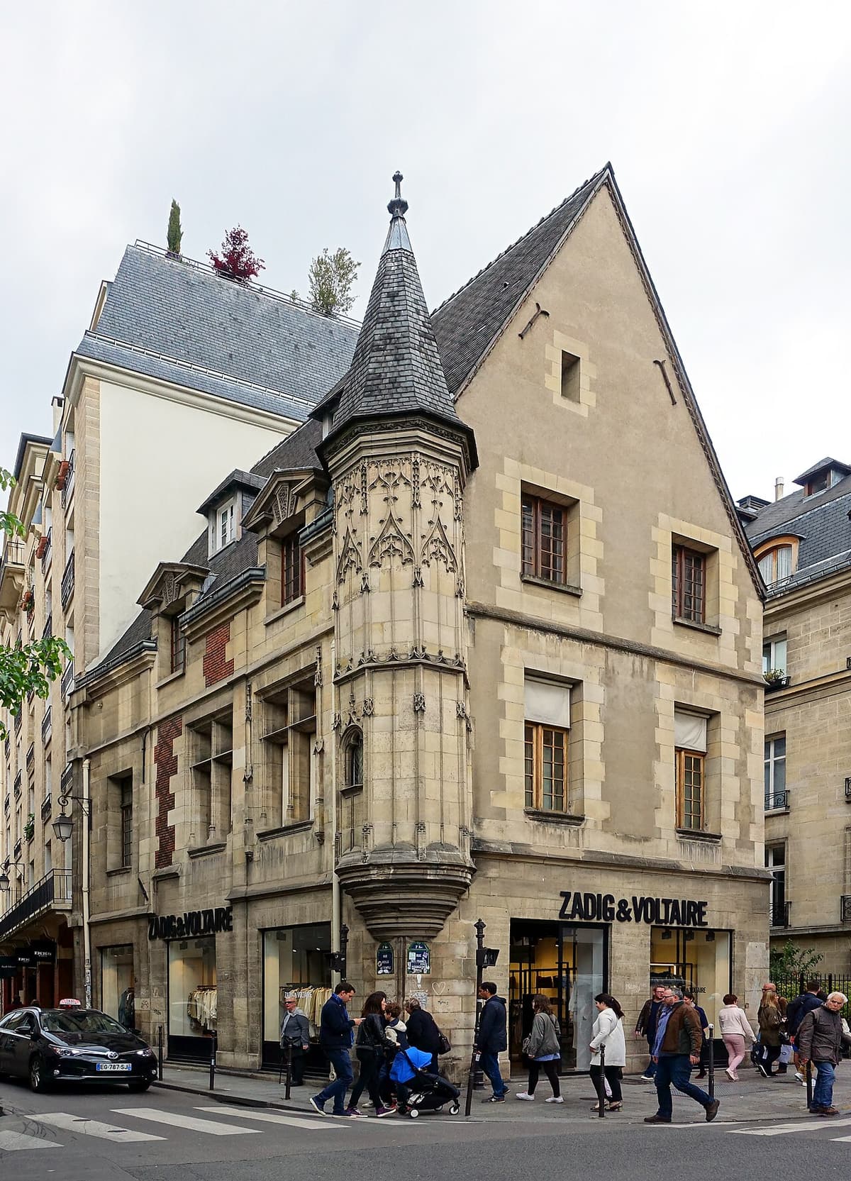 The corner turret of the Hôtel Hérouet on a street corner in the Marais