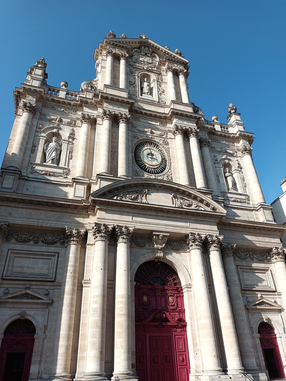 The tall baroque facade of the church of Saint-Paul-Saint-Louis on Rue Saint-Antoine